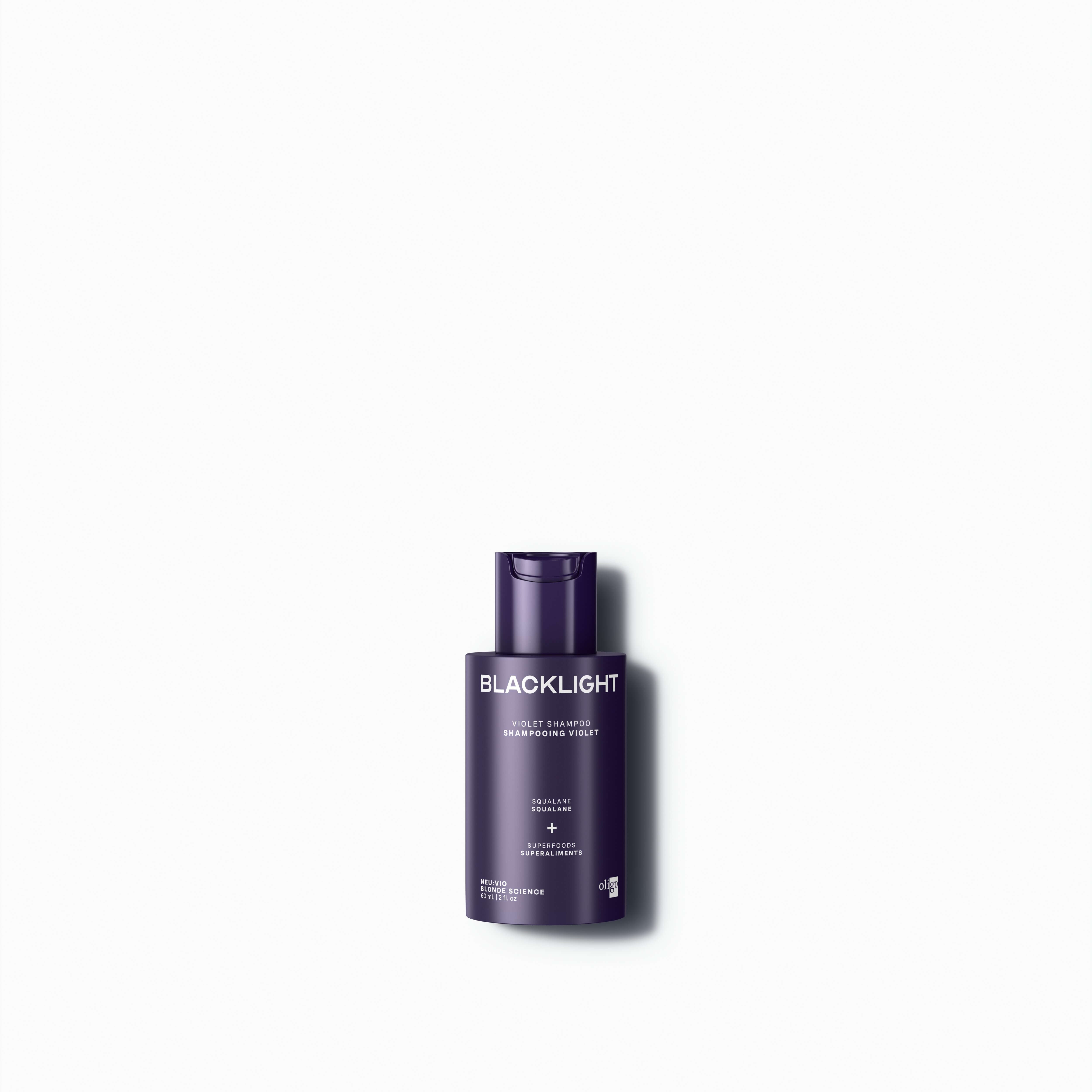 Front of bottle of Blacklight Blonde Science Neutralizing Violet Shampoo 60 ml #size_60 ml / 2 fl. oz