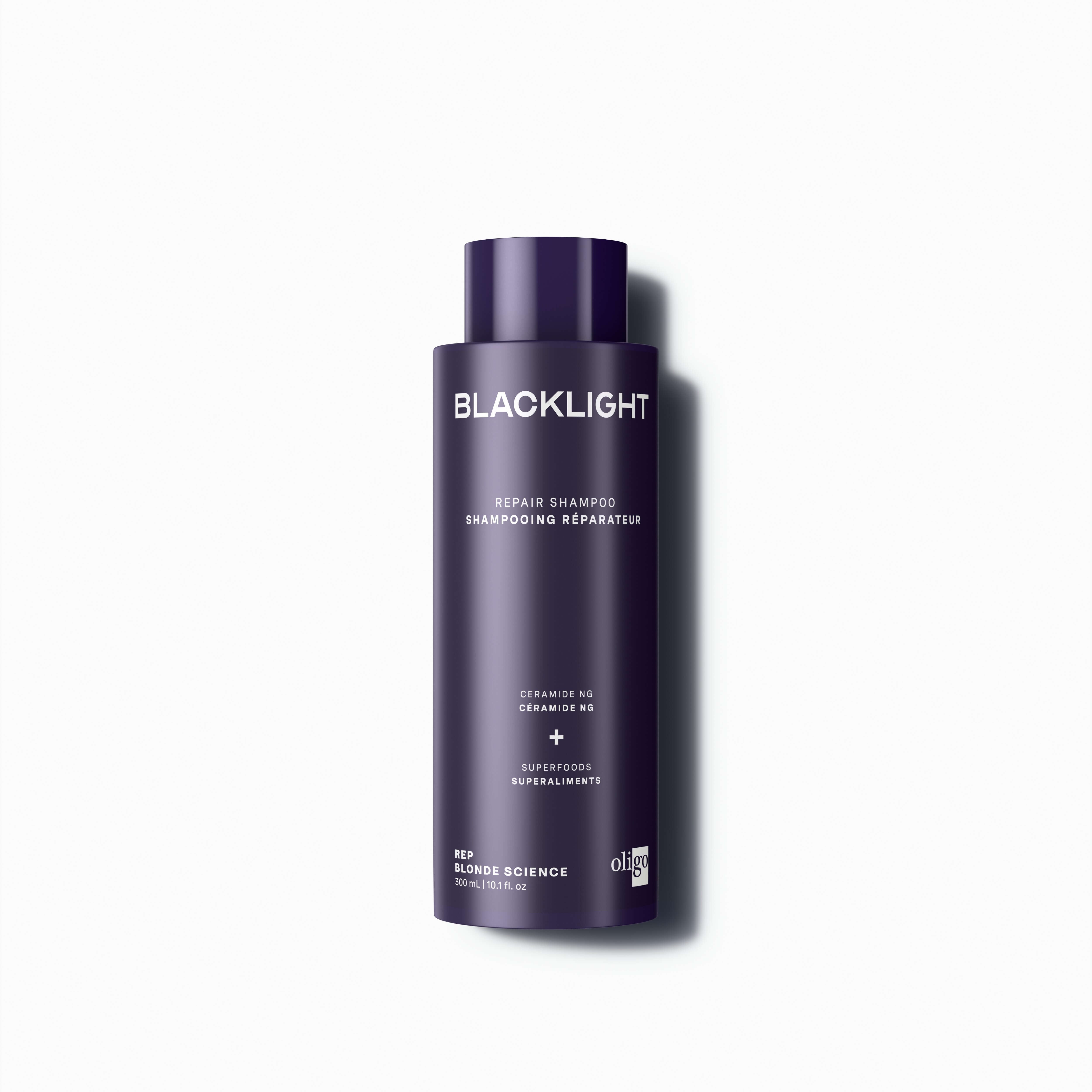 Front of bottle of Blacklight Blonde Science Repair Shampoo for Blonde Hair 300ml #size_300 ml / 10.1 fl. oz