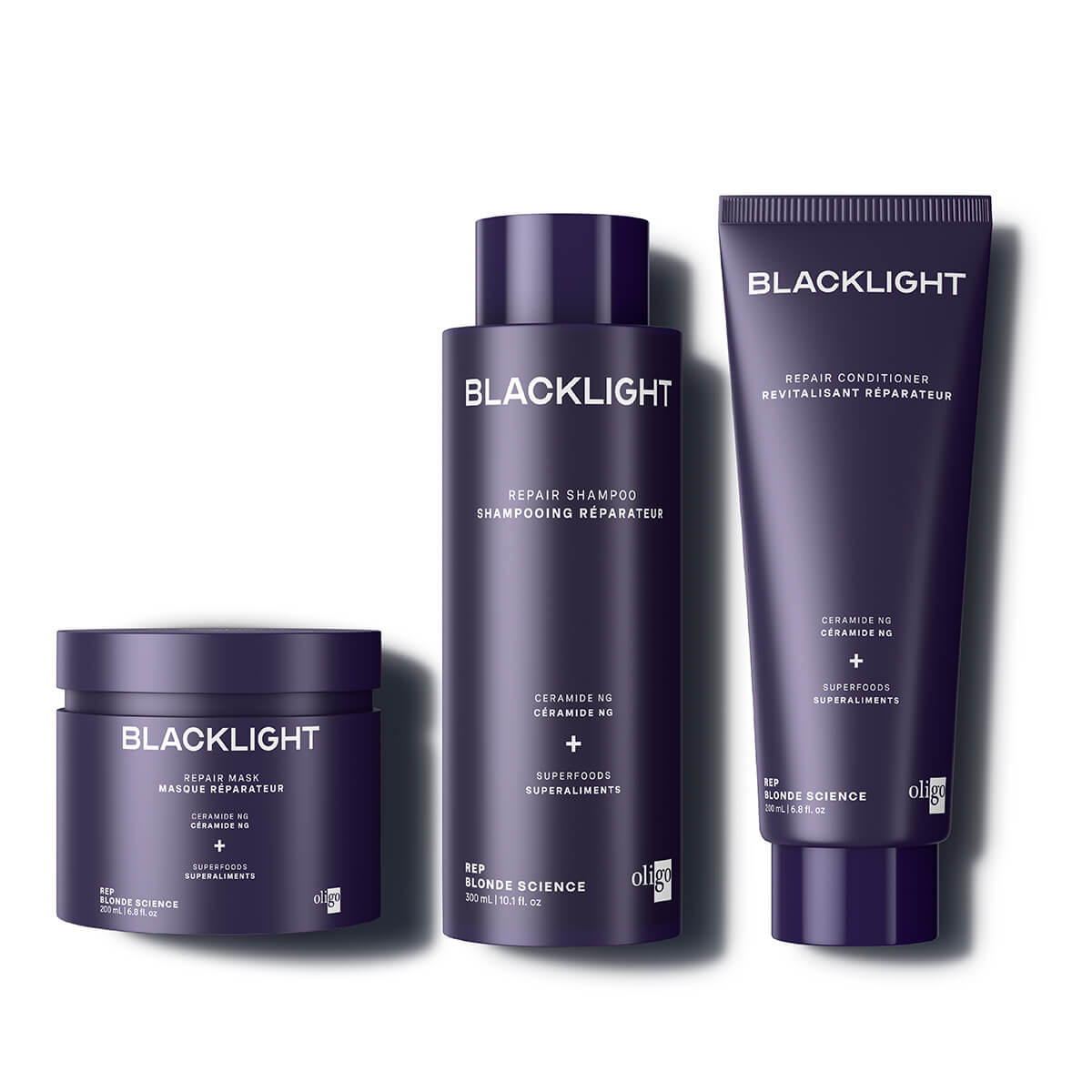 3 bottles of Blacklight Blonde Science Repair Products for Blonde Hair including a shampoo, conditioner and mask that are included in a bundle