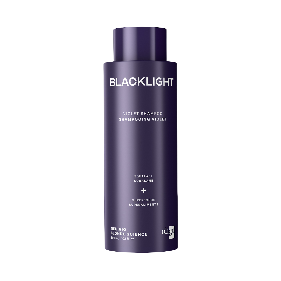 Purple bottle of Blacklight Blonde Science Violet Shampoo